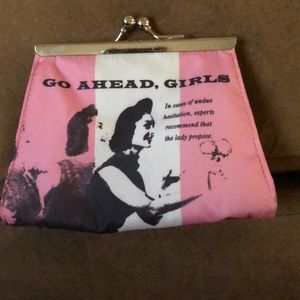 Benefit small makeup case.